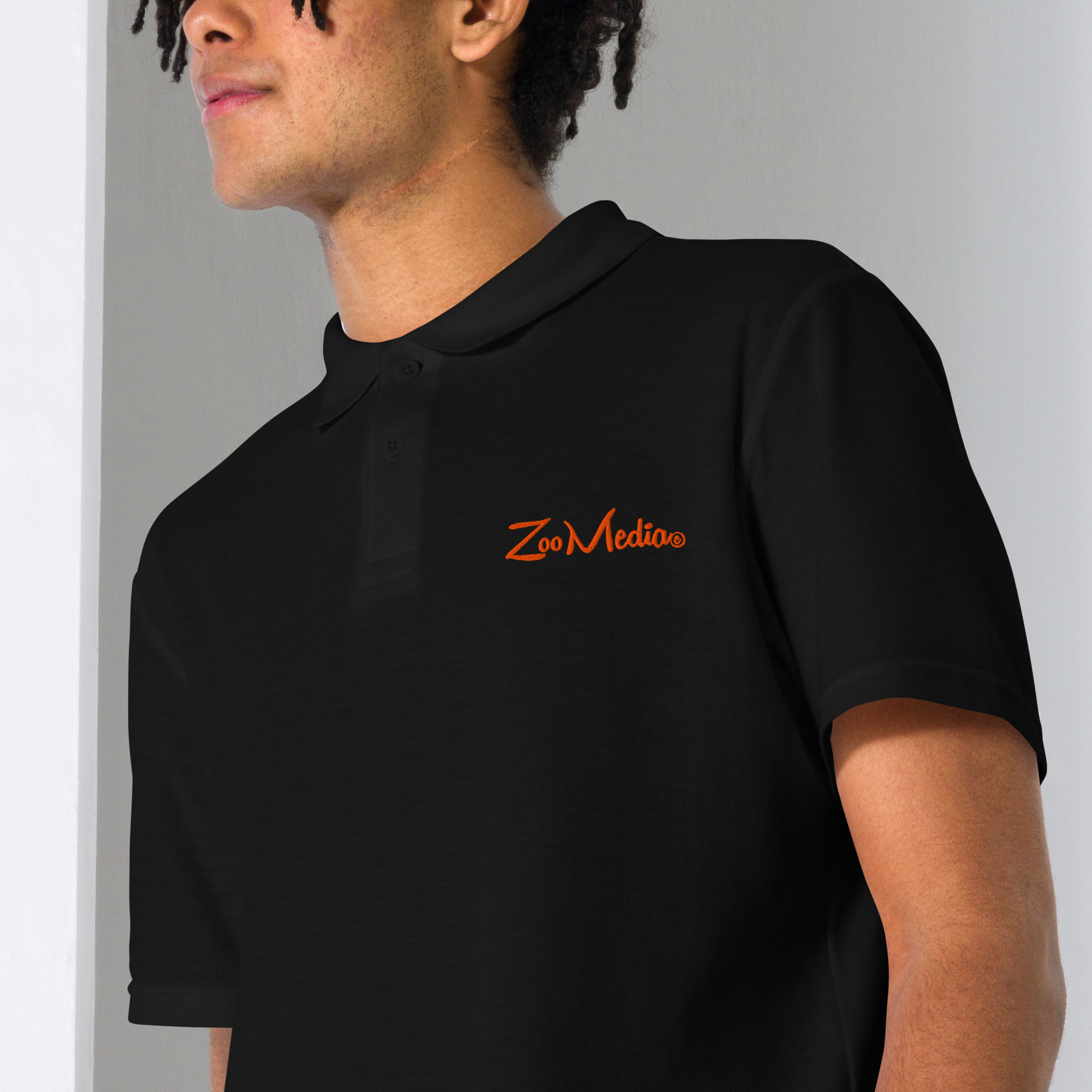 unisex-pique-polo-shirt-black-zoomed-in-69a62a9ce6a53.jpg