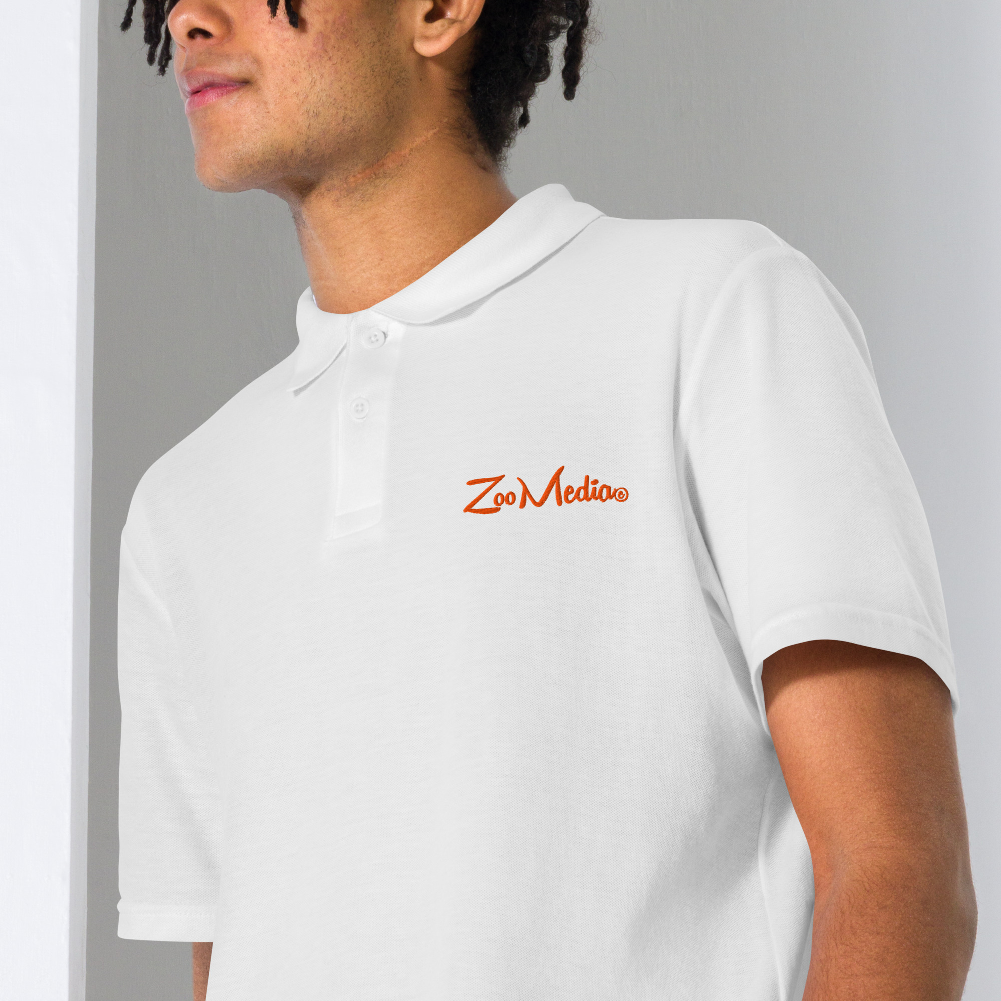 unisex-pique-polo-shirt-white-zoomed-in-69a62a9ce8bab.jpg